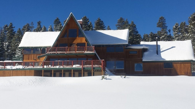 Winter exterior view of large rental house on Peak 7 in Breckenridge